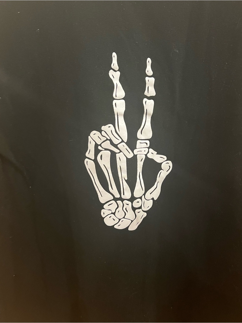 Unk Black Short Sleeve Tee with White Skeleton Hand Graphic